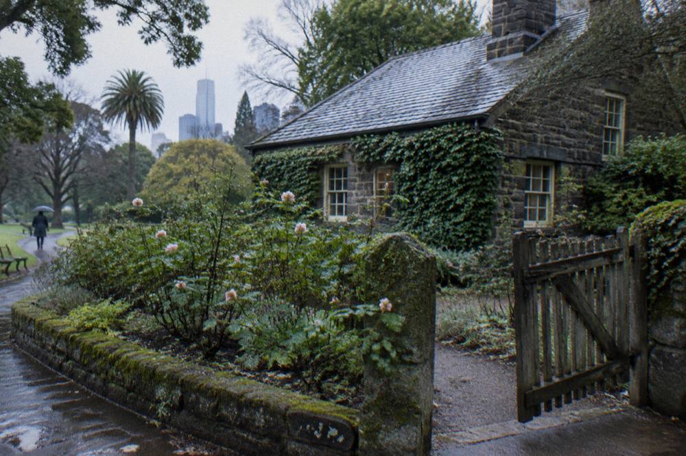 Cooks' Cottage in Fitzroy Gardens, a small stone cottage with a heritage garden