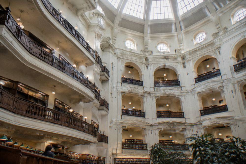 The octagonal balconies of the La Trobe Reading Room rising toward the glass dome overhead