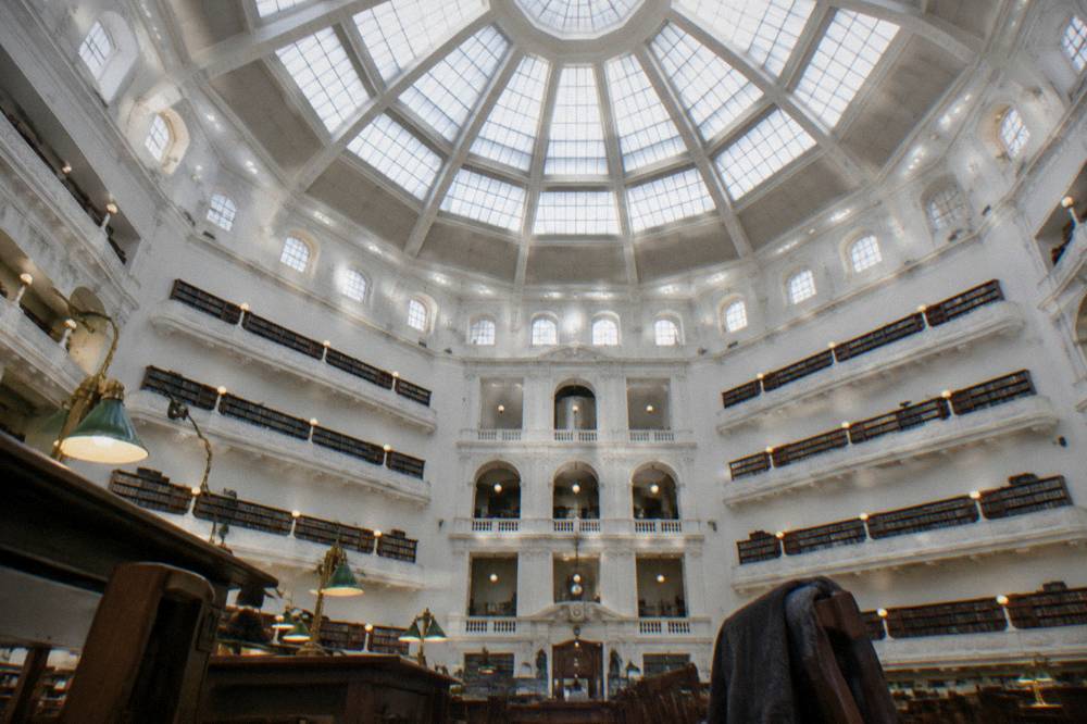 The glass-domed reading room of the State Library of Victoria seen from below